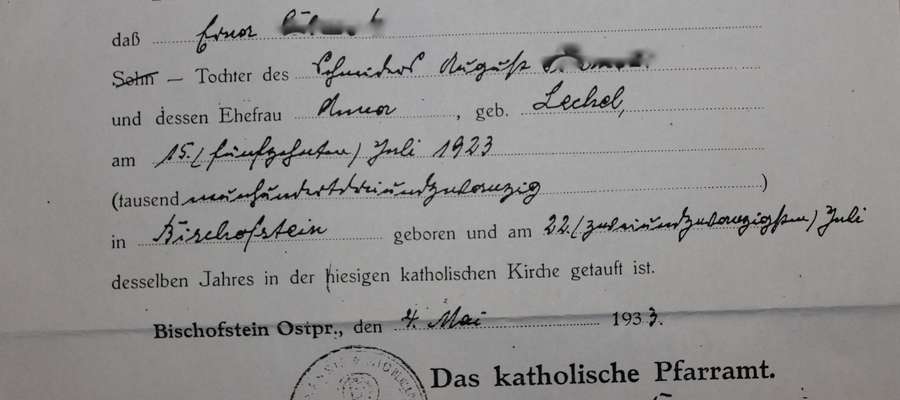 Częściowo nieczytelny dokument parafialny wystawiony w maju 1933 roku w Bisztynku.