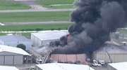 Pożar hangaru na lotnisku. Gęste kłęby dymu widoczne były z daleka 