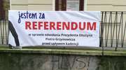 Referendum w Olsztynie: Zasłonili zdjęcie prezydenta Piotra Grzymowicza 