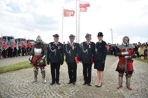 Honorowa odznaka dla dh Andrzeja Ochlaka na wojewódzkim święcie strażaków pod Grunwaldem